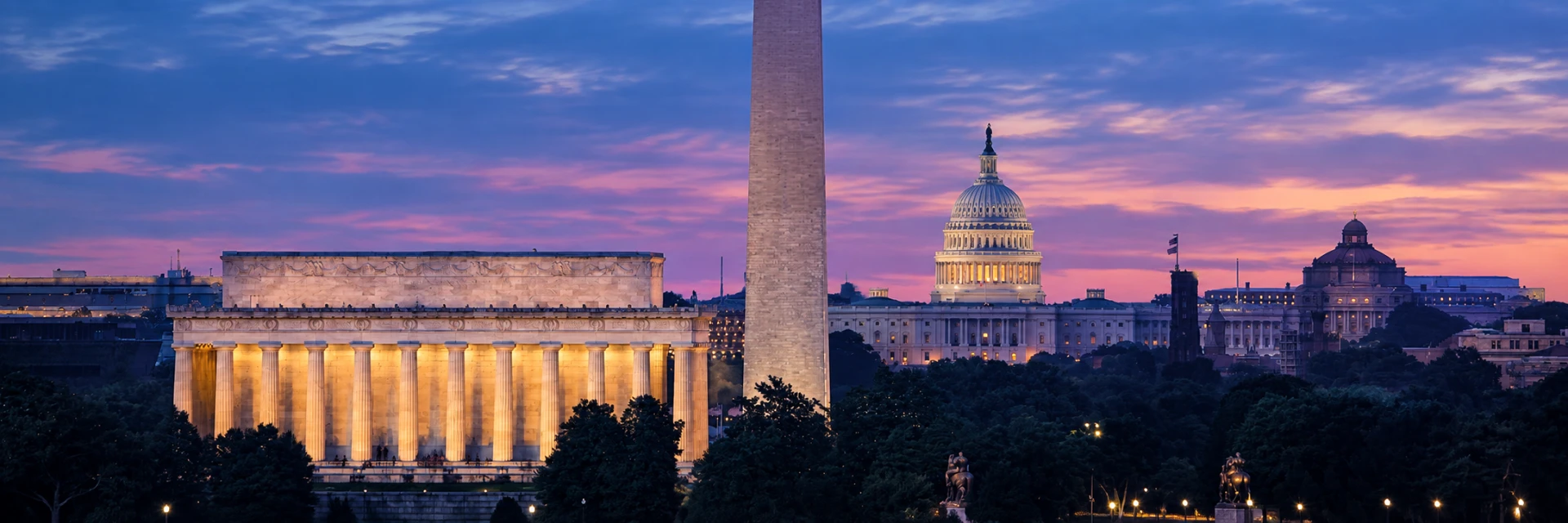 The Lincoln Memorial, Washington Monument, and U.S. Capitol at dusk